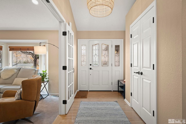 entryway with light wood-style flooring