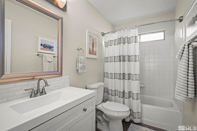 full bathroom featuring vanity, shower / bath combo with shower curtain, backsplash, and toilet