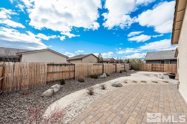 view of patio with a fenced backyard