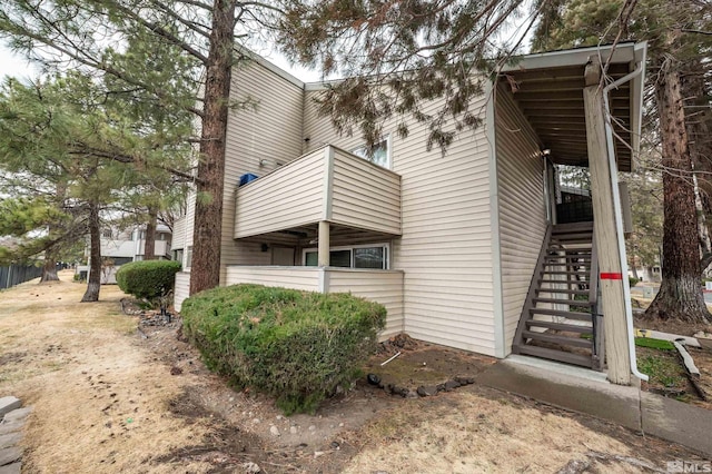 view of property exterior with stairs