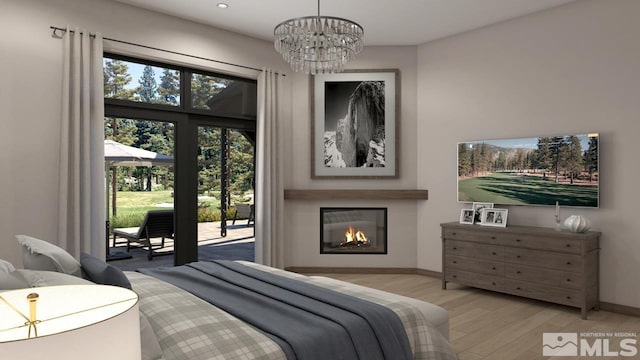 bedroom featuring a glass covered fireplace, wood finished floors, a chandelier, access to outside, and baseboards