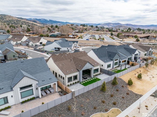 birds eye view of property with a residential view and a mountain view