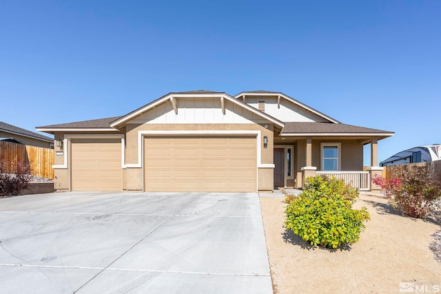 ranch-style house featuring a garage, driveway, roof with shingles, fence, and a porch