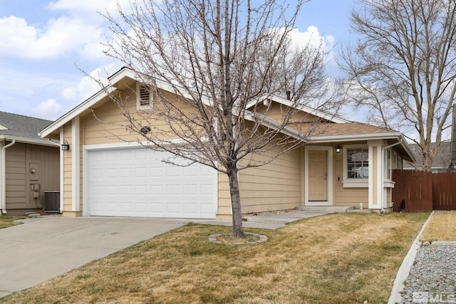 view of front facade with concrete driveway, an attached garage, central AC, fence, and a front lawn