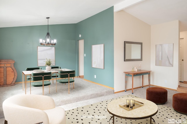 dining space with lofted ceiling with beams, a chandelier, and baseboards