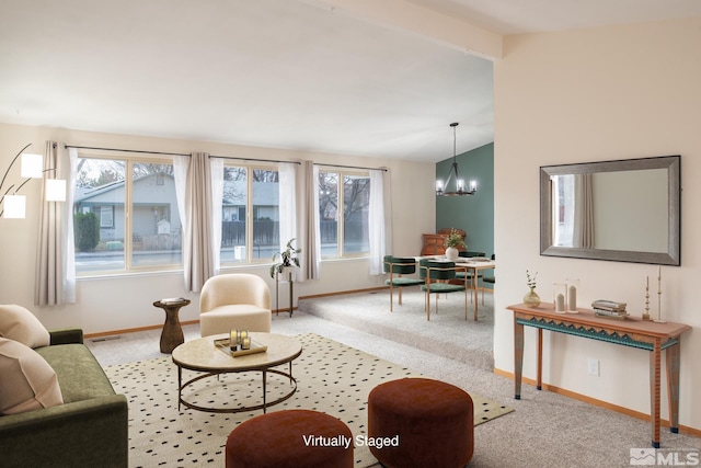 living room with a notable chandelier, visible vents, lofted ceiling with beams, carpet flooring, and baseboards