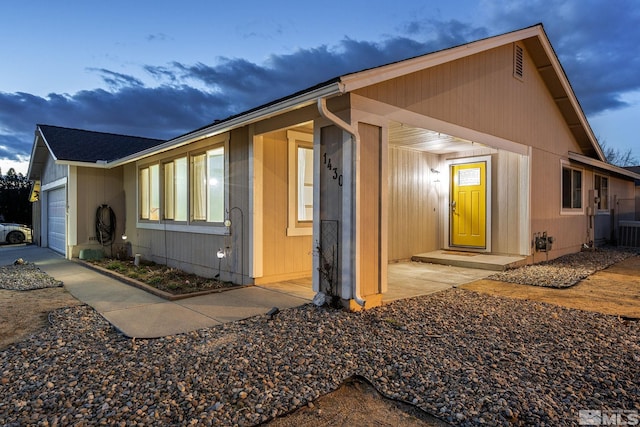 view of home's exterior featuring an attached garage