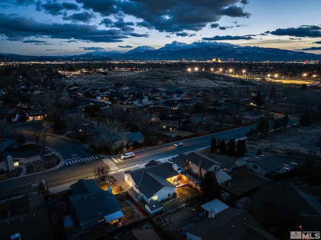 aerial view at dusk with a mountain view