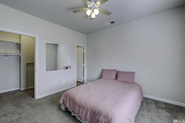 bedroom featuring carpet, a closet, visible vents, and baseboards