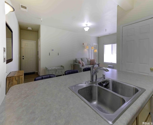 kitchen featuring a sink and visible vents