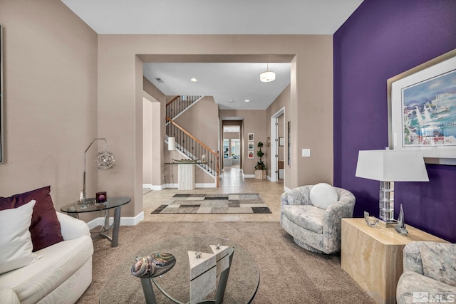 living area featuring carpet, stairway, baseboards, and recessed lighting