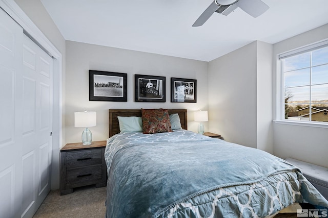 carpeted bedroom featuring ceiling fan