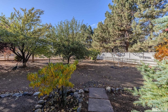 view of yard with fence