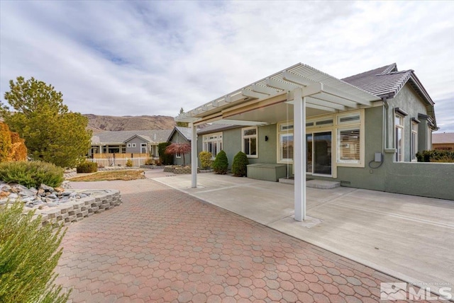 view of patio featuring a mountain view