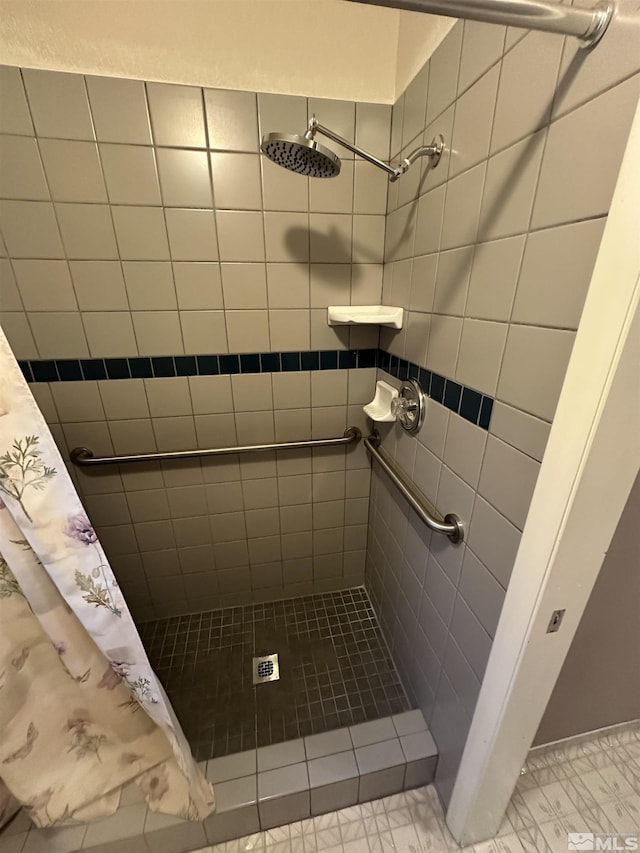 full bathroom with a stall shower