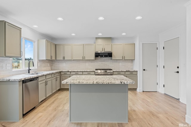 kitchen with ornamental molding, range hood, gray cabinets, stainless steel appliances, and a sink