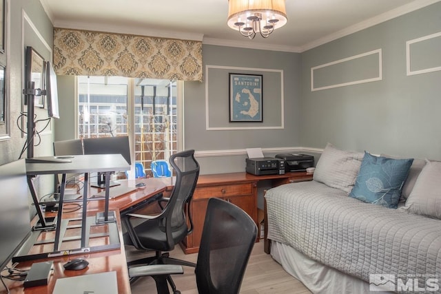 office featuring light wood-style floors, an inviting chandelier, and crown molding