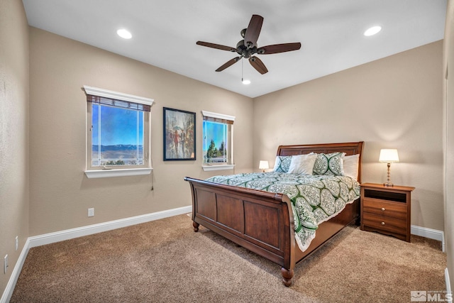 carpeted bedroom featuring recessed lighting, a ceiling fan, and baseboards