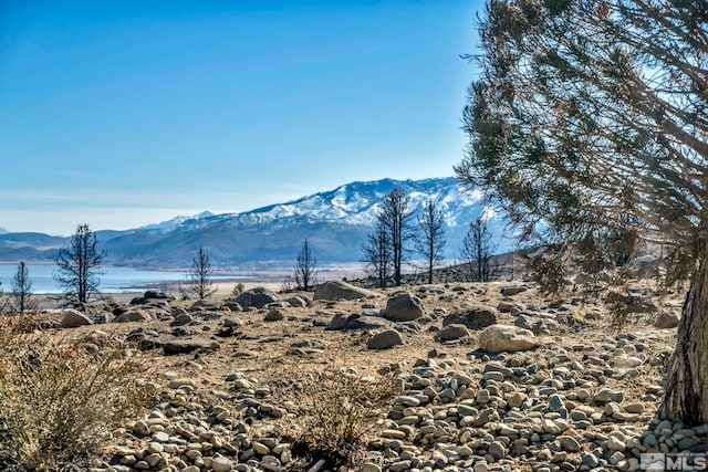 view of mountain feature featuring a water view