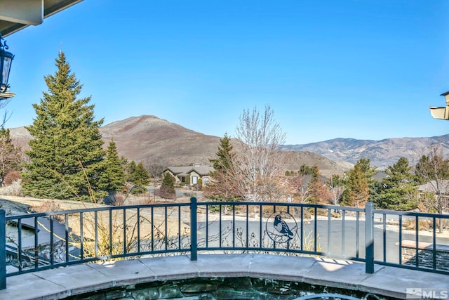 view of pool with a mountain view