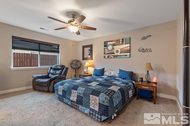 bedroom with visible vents, baseboards, and carpet flooring