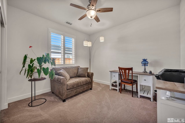 living area with a ceiling fan, baseboards, visible vents, and carpet flooring