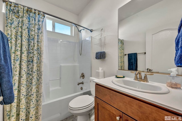 full bathroom with shower / tub combo, vanity, and toilet