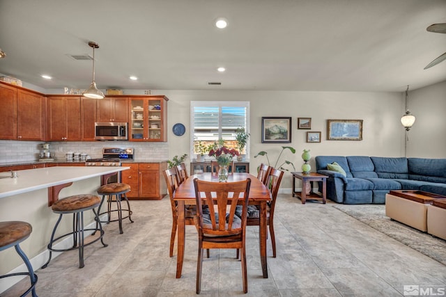 dining area with visible vents and recessed lighting