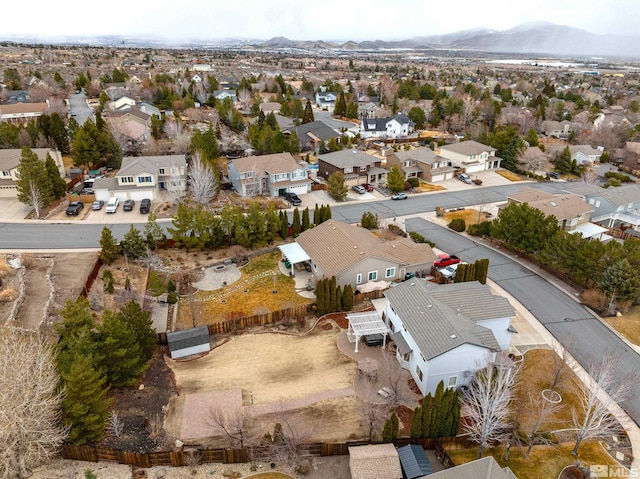 bird's eye view with a residential view and a mountain view