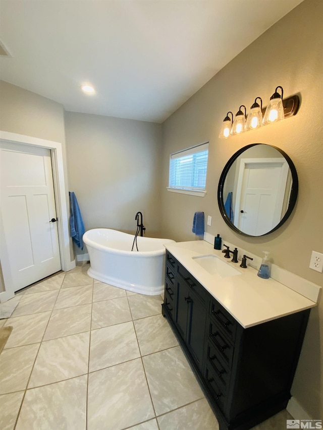 full bath with a soaking tub, tile patterned flooring, vaulted ceiling, and vanity