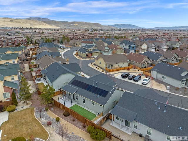 bird's eye view with a residential view and a mountain view