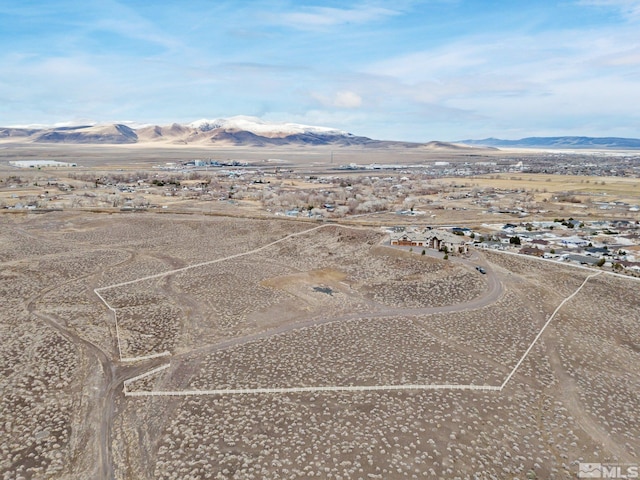 drone / aerial view featuring a mountain view