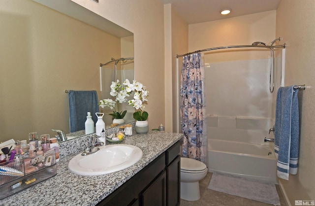 full bathroom featuring toilet, tile patterned flooring, shower / tub combo with curtain, and vanity