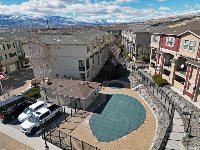 bird's eye view with a residential view and a mountain view