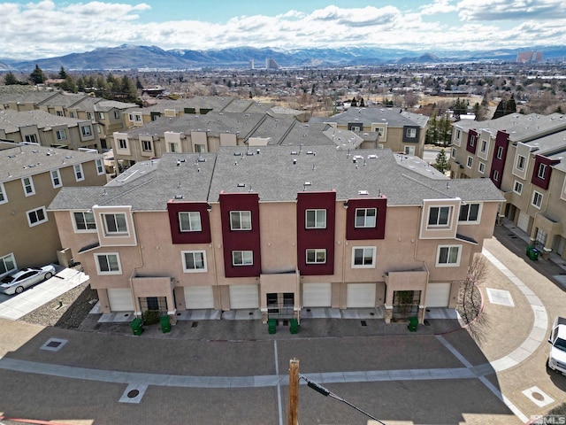 birds eye view of property featuring a residential view and a mountain view