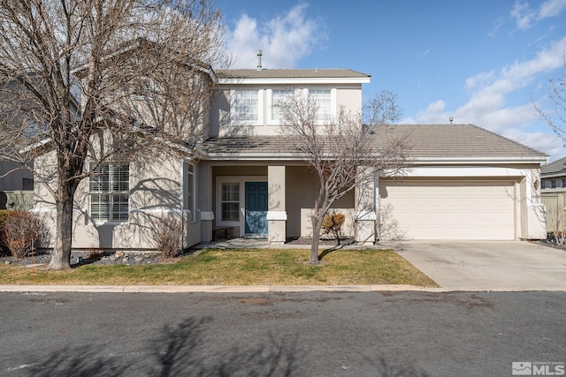 traditional-style house with stucco siding, driveway, and an attached garage