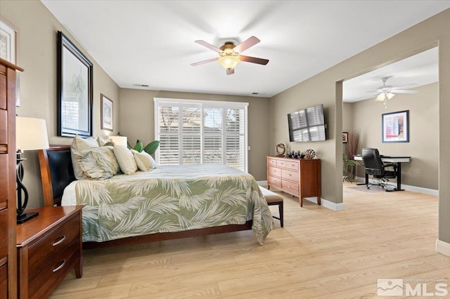 bedroom with access to exterior, light wood-style flooring, baseboards, and ceiling fan