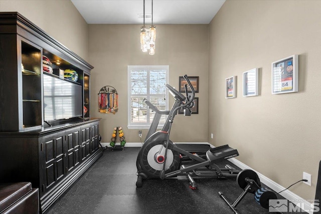 workout area with visible vents and baseboards