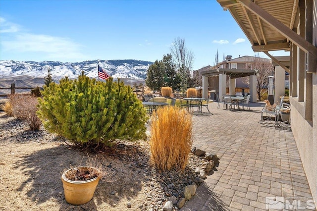 view of patio with a mountain view