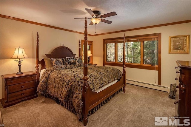 bedroom featuring ornamental molding, a baseboard radiator, carpet, and a ceiling fan