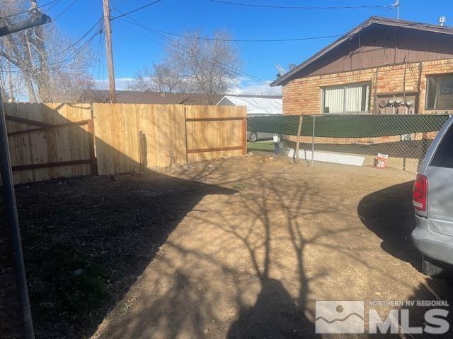 view of yard featuring fence private yard