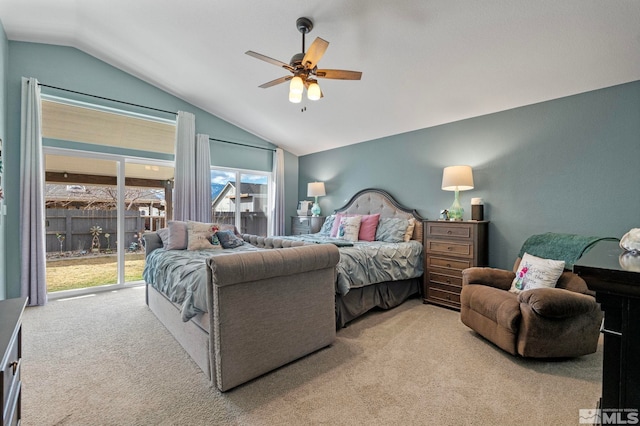 bedroom with access to outside, light colored carpet, vaulted ceiling, and ceiling fan