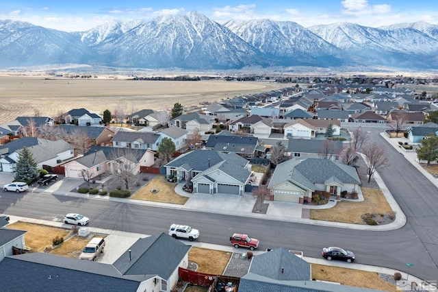 aerial view featuring a residential view and a mountain view