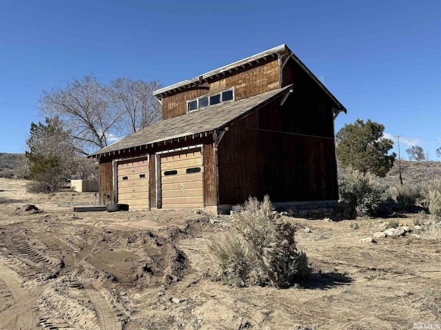 view of detached garage