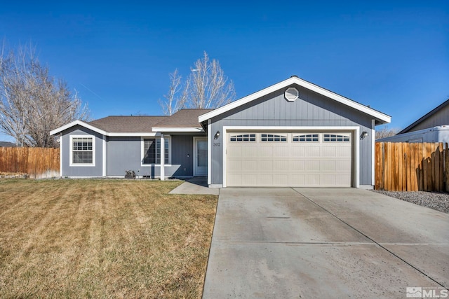 single story home featuring a garage, driveway, a front yard, and fence