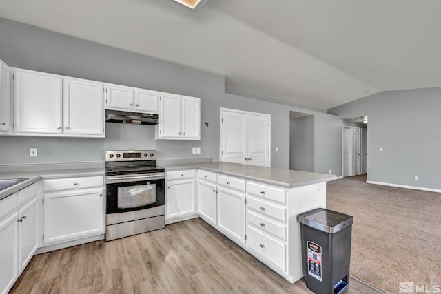 kitchen with light countertops, under cabinet range hood, white cabinetry, and electric range