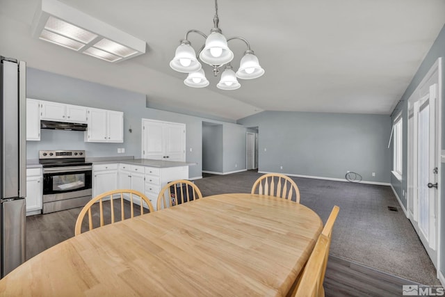 dining space featuring dark colored carpet, visible vents, vaulted ceiling, a chandelier, and baseboards