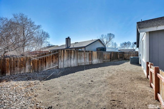 exterior space featuring a fenced backyard