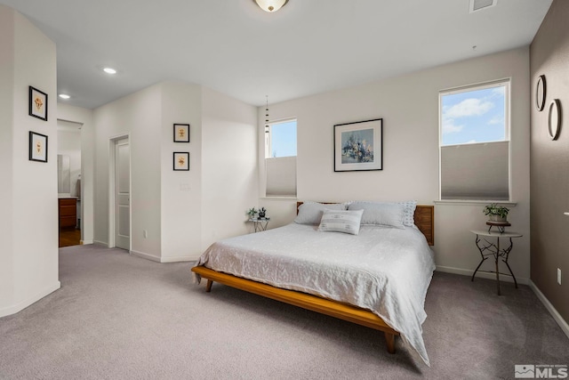 bedroom featuring recessed lighting, carpet flooring, visible vents, and baseboards