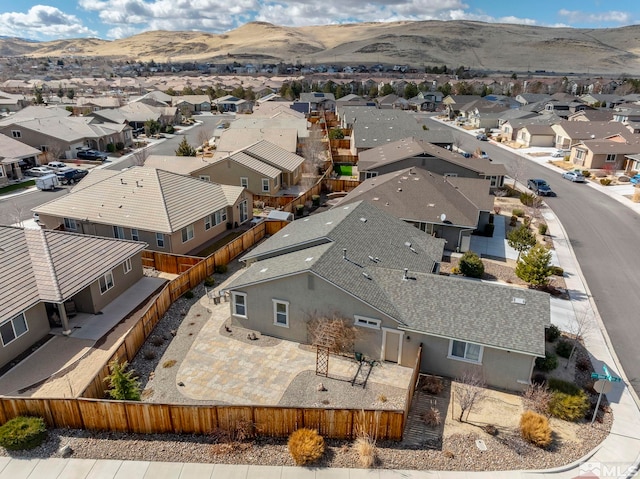 birds eye view of property featuring a residential view and a mountain view